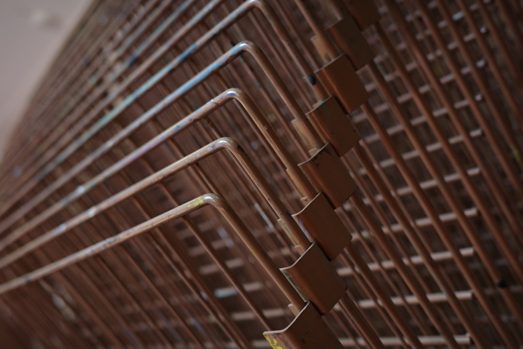 Close-up of dust-clogged AC condenser coils in a desert environment
