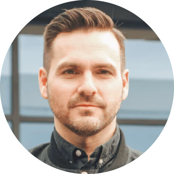 Man with short beard headshot