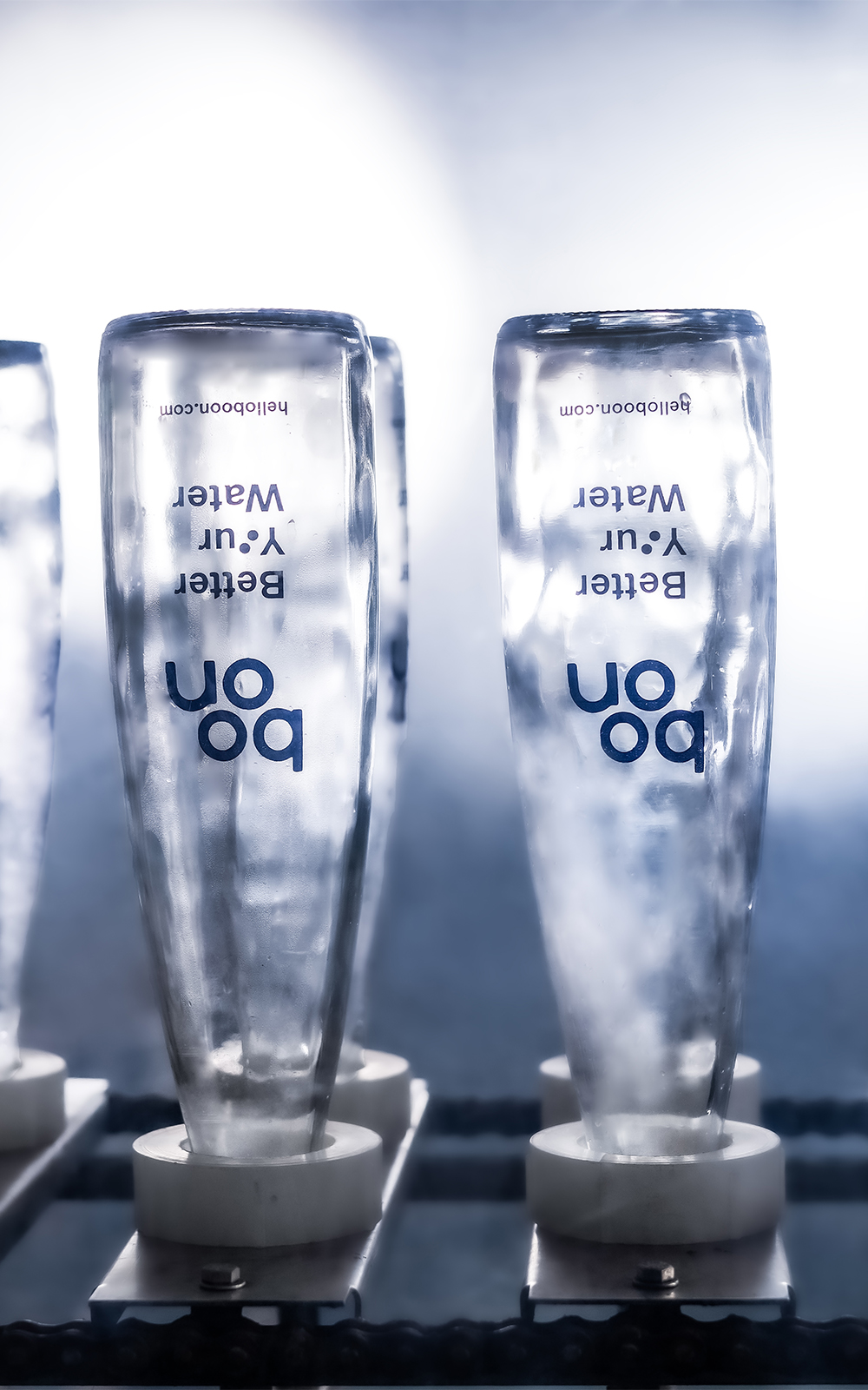Boon waterbottles in a bottling chamber