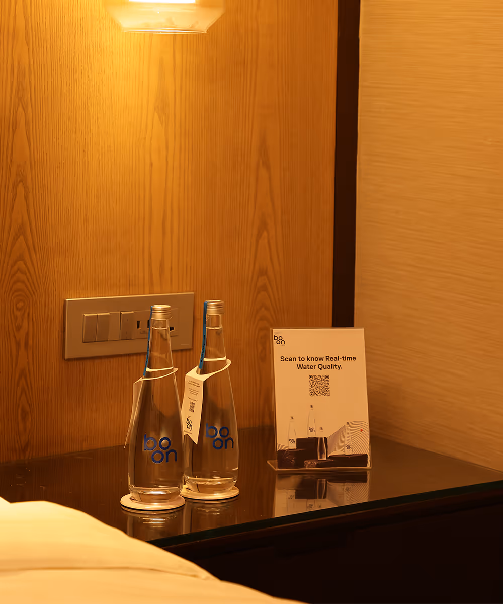 Boon bottles in a hotel room desk