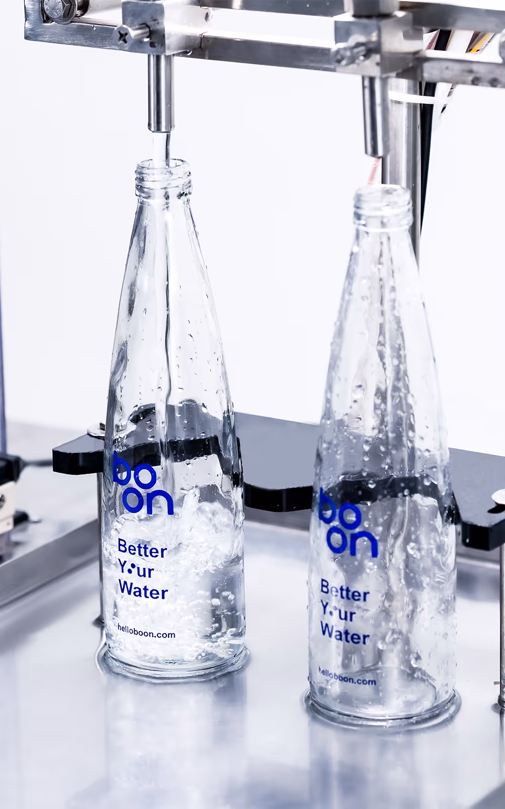 Boon water bottles in a filling machine