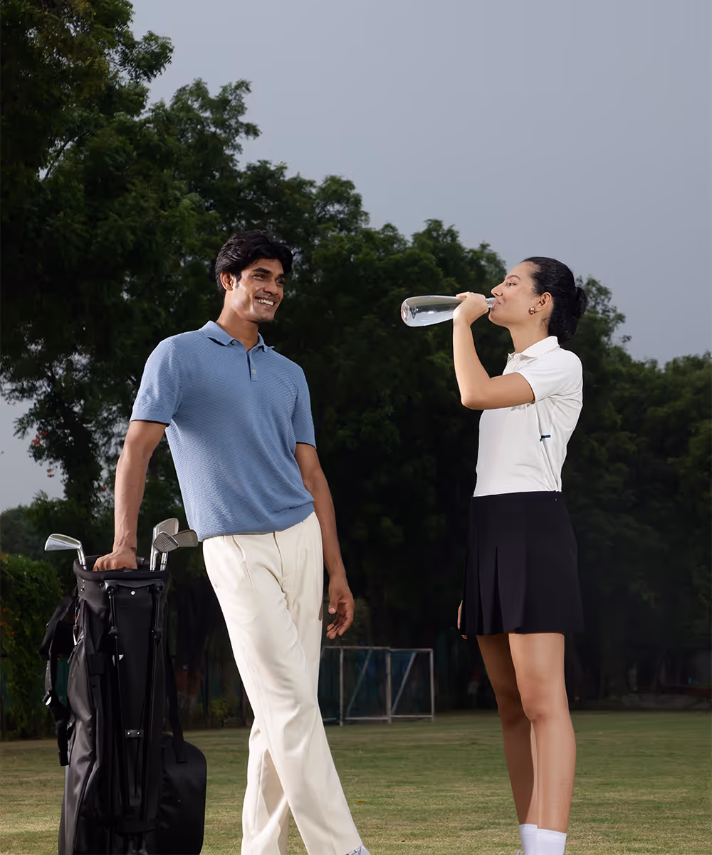A happy couple drinking boon water