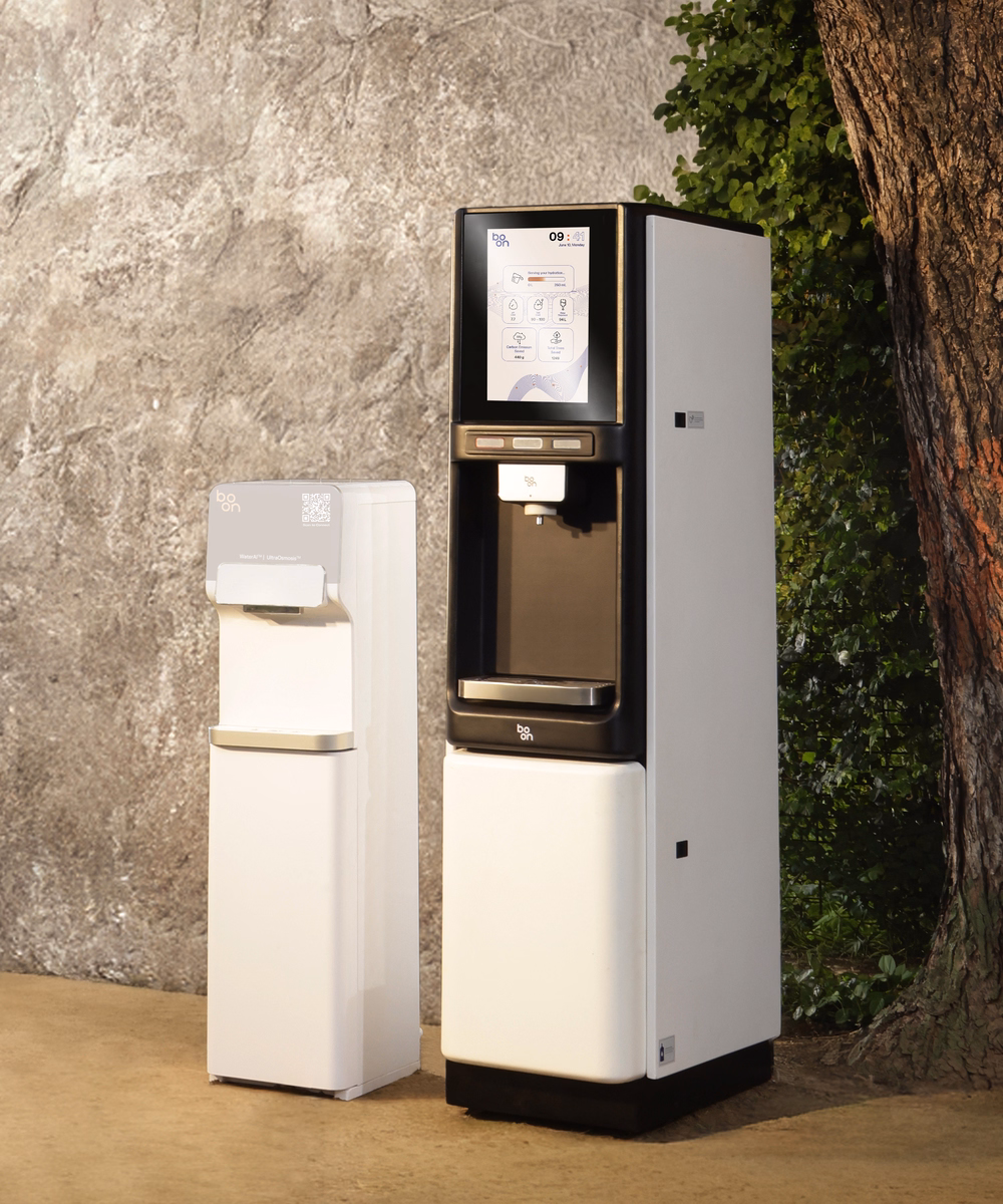 Two boon purifiers beside a tree