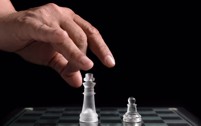 Hand playing chess