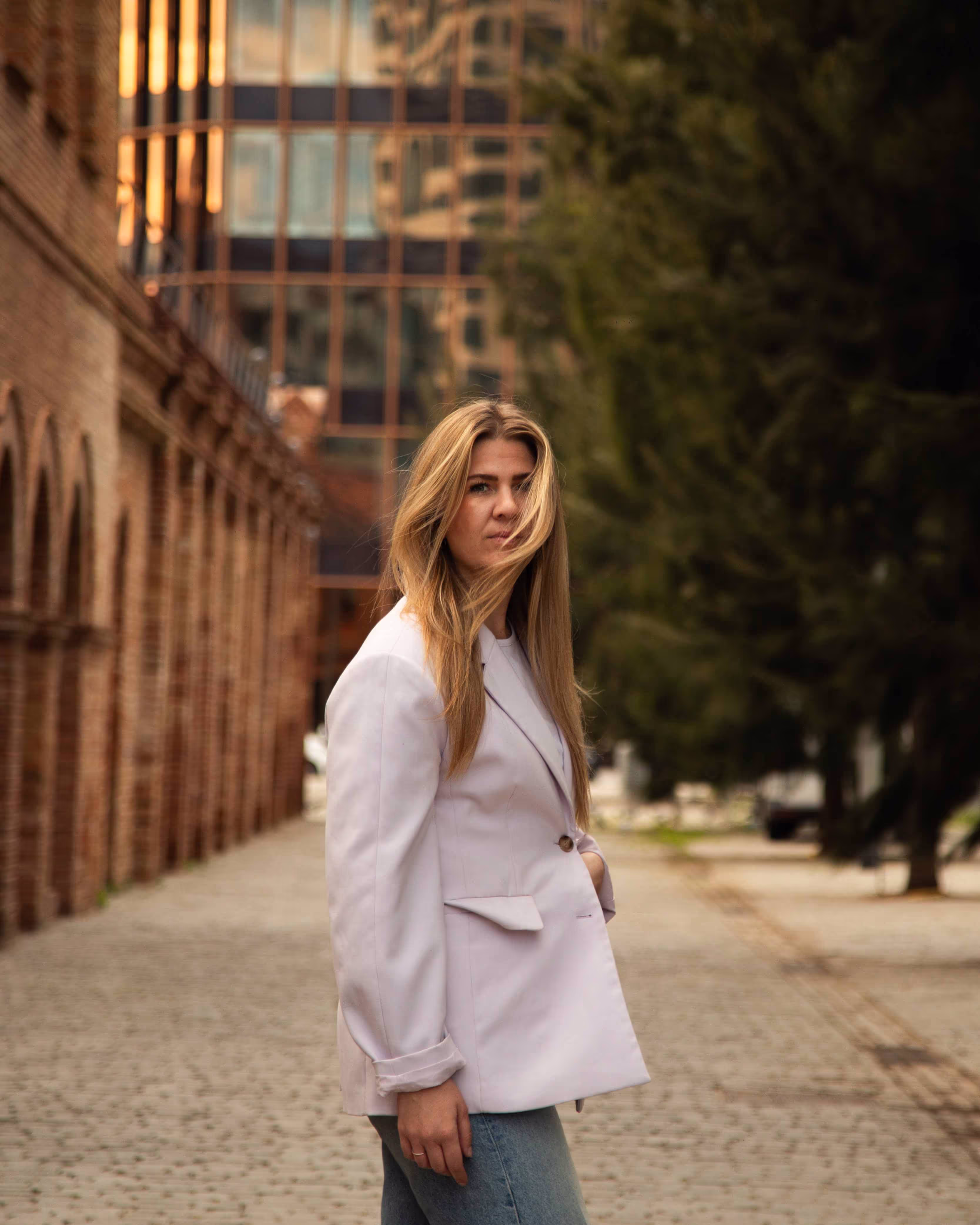 The CEO staring at the camera, with a purple blazer.