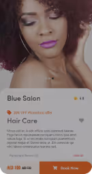 Close-up of a woman with curly hair and purple lipstick, eyes closed, gently touching her neck.