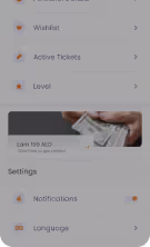 Mobile app screen showing menu options including Wishlist, Active Tickets, Level, Settings, Notifications, and Language, with a hand holding cash in the center.