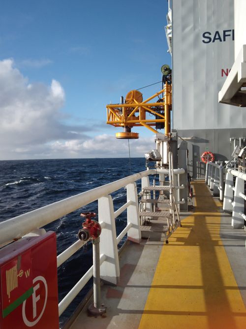 Winch attached to a supply ship in operation.