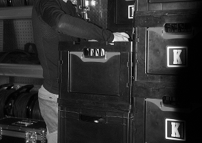 A van full of euroboxes with video production gear