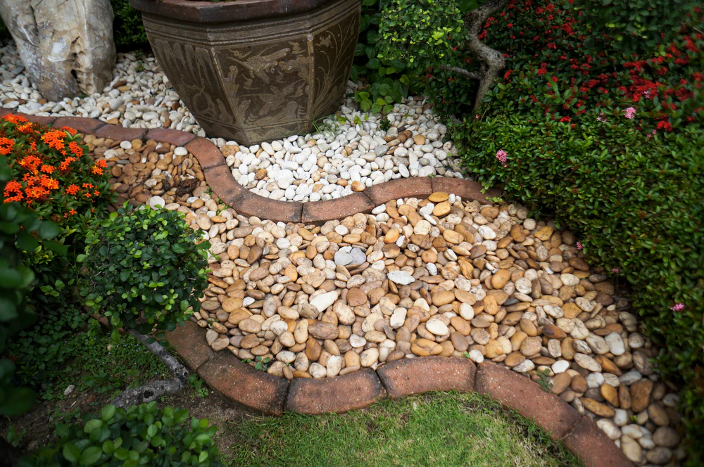 Modern garden pathway with stepping stones and decorative landscaping for a Hobart home