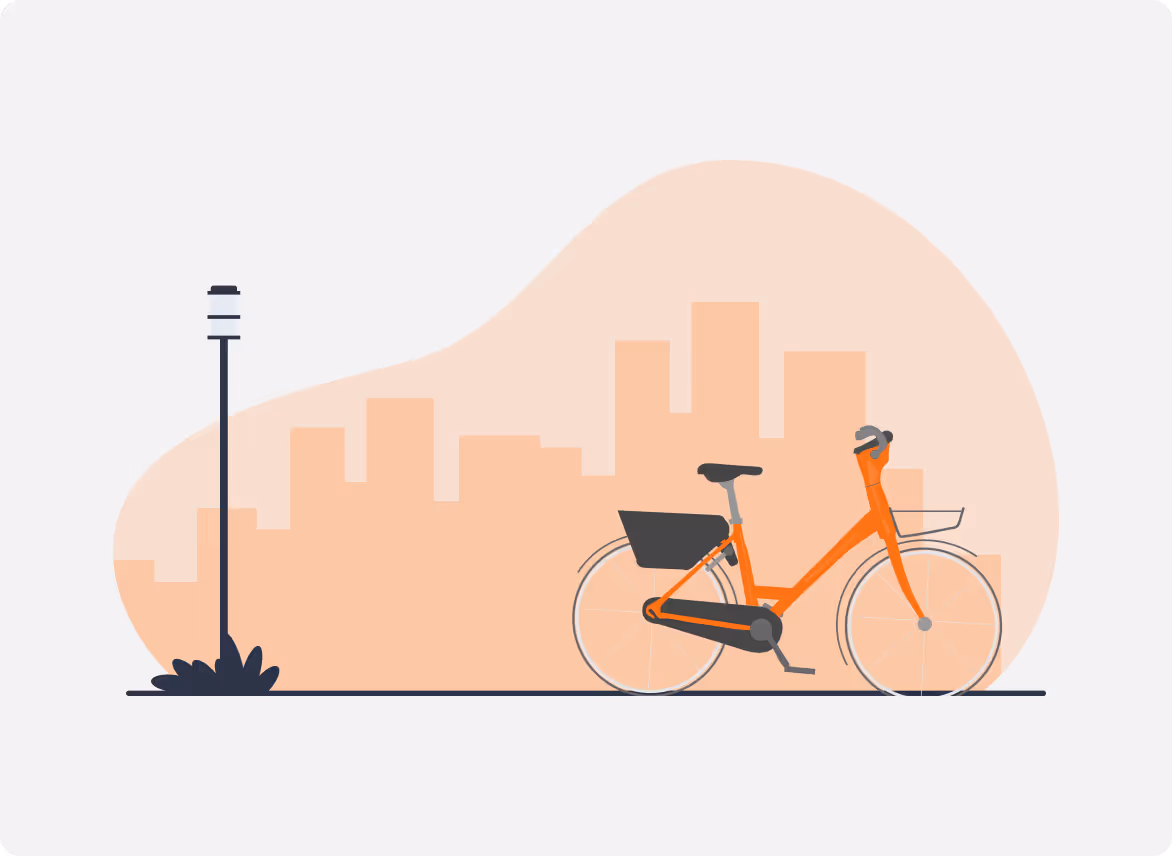 An orange bicycle parked next to a lamp post.