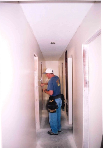 Stace working in hallway