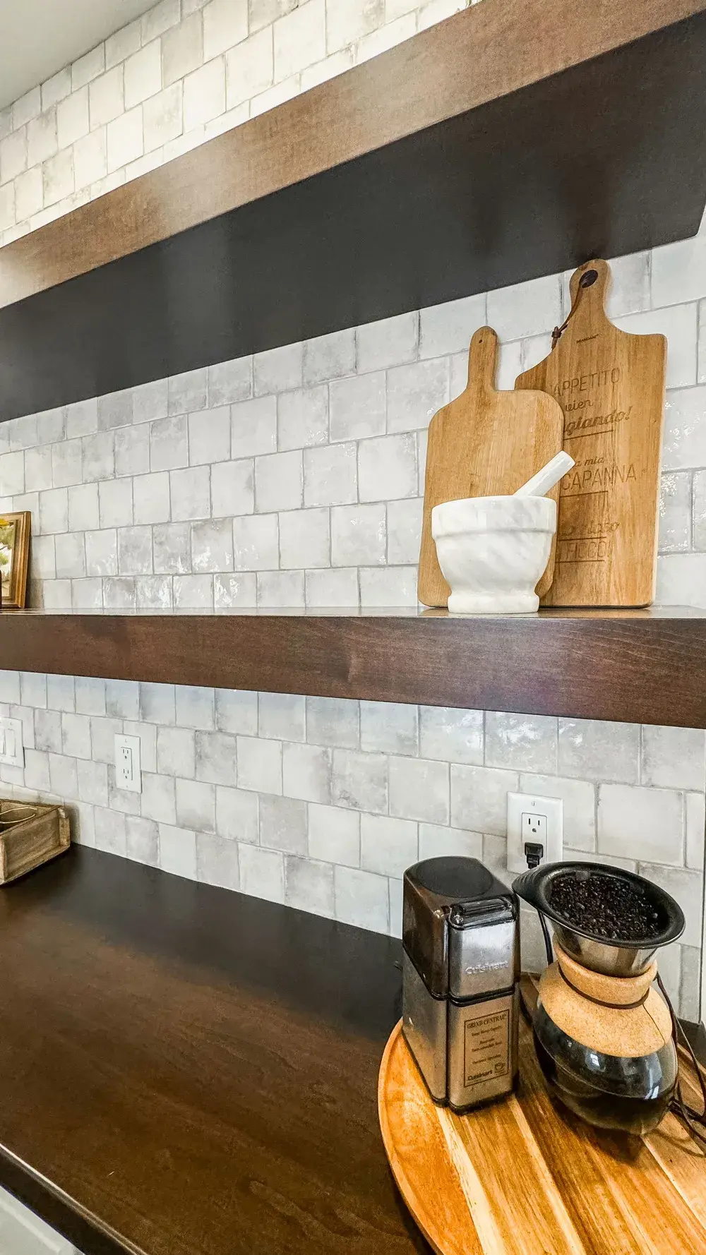 kitchen with custom backsplash and floating shelves