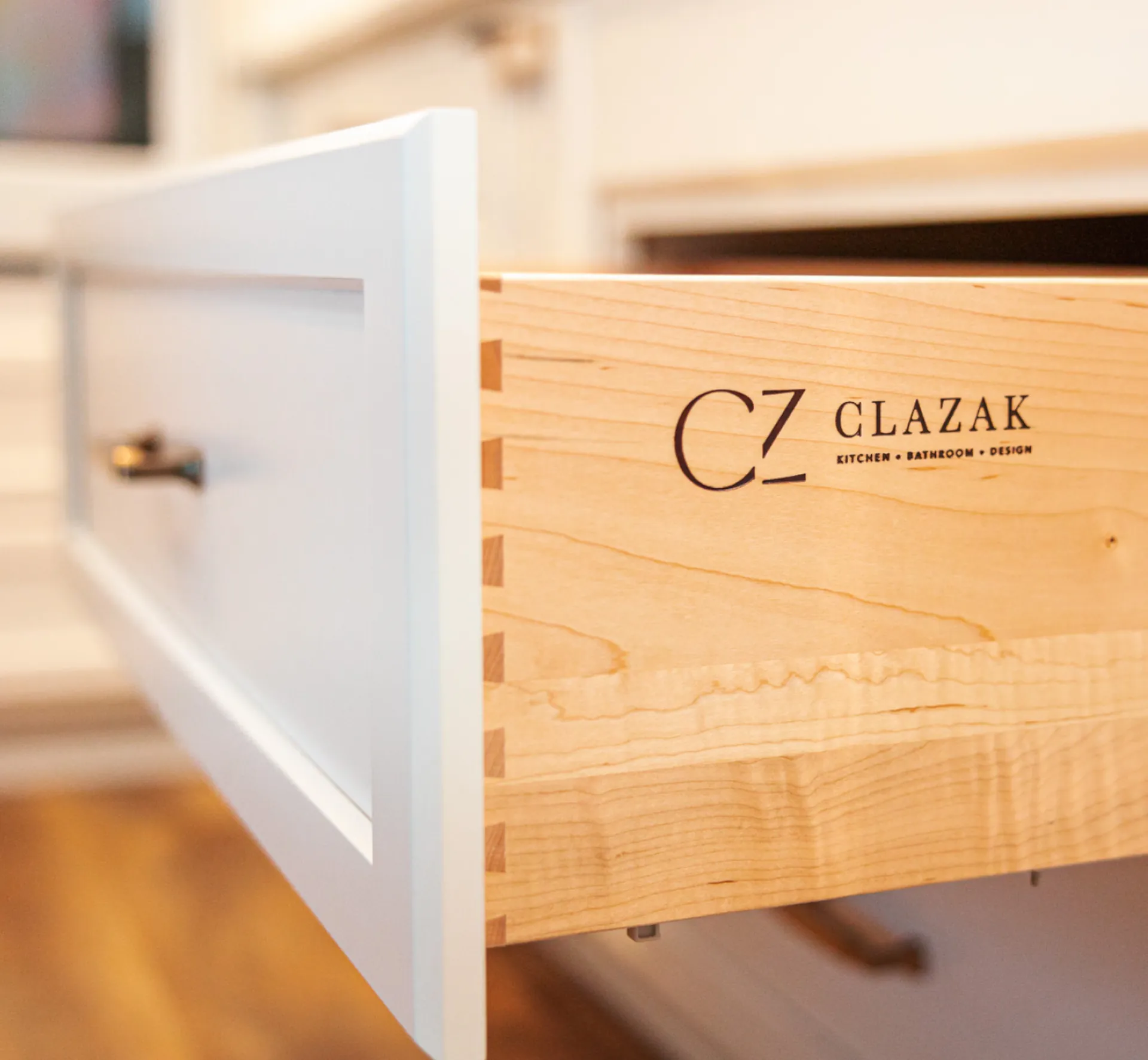 Custom wooden cabinetry with the Clazak logo