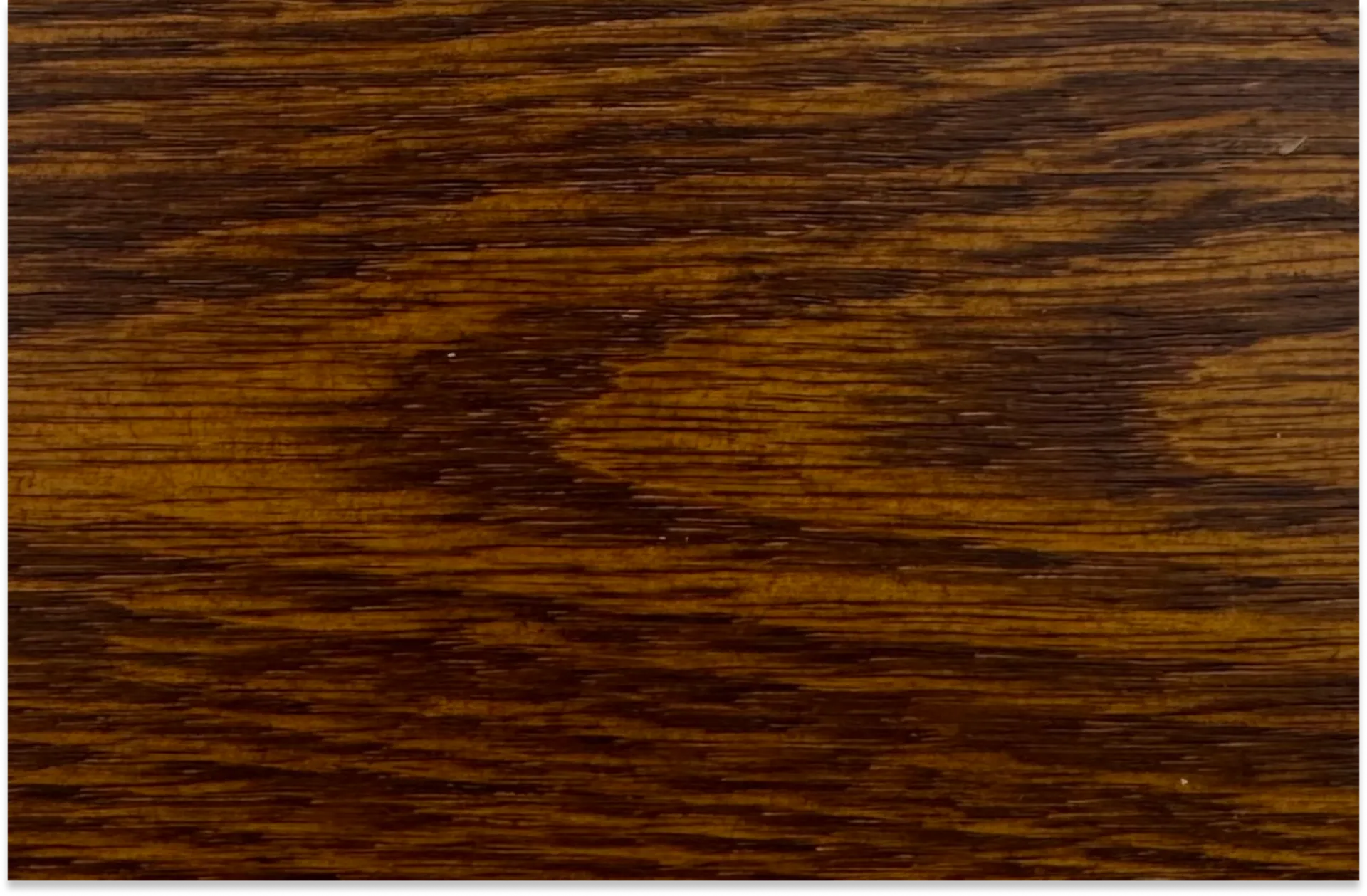 Close up photo of a brown wood species