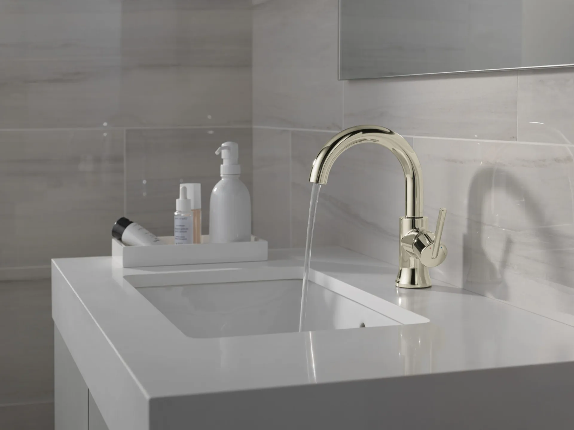 Lumicoat on a stainless faucet in white bathroom