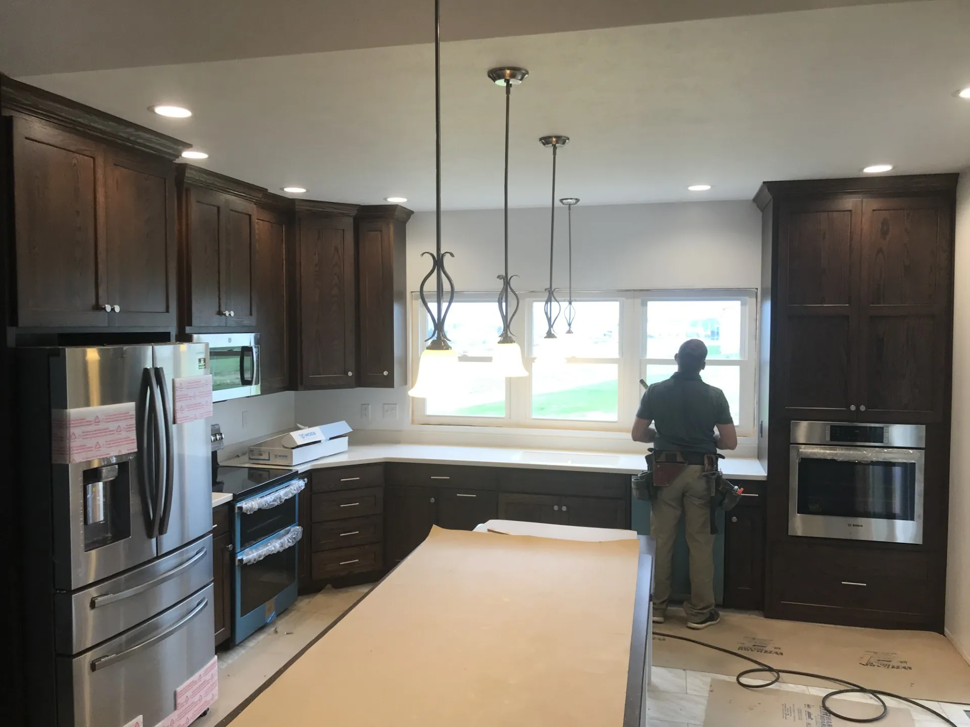 man working on a kitchen remodel
