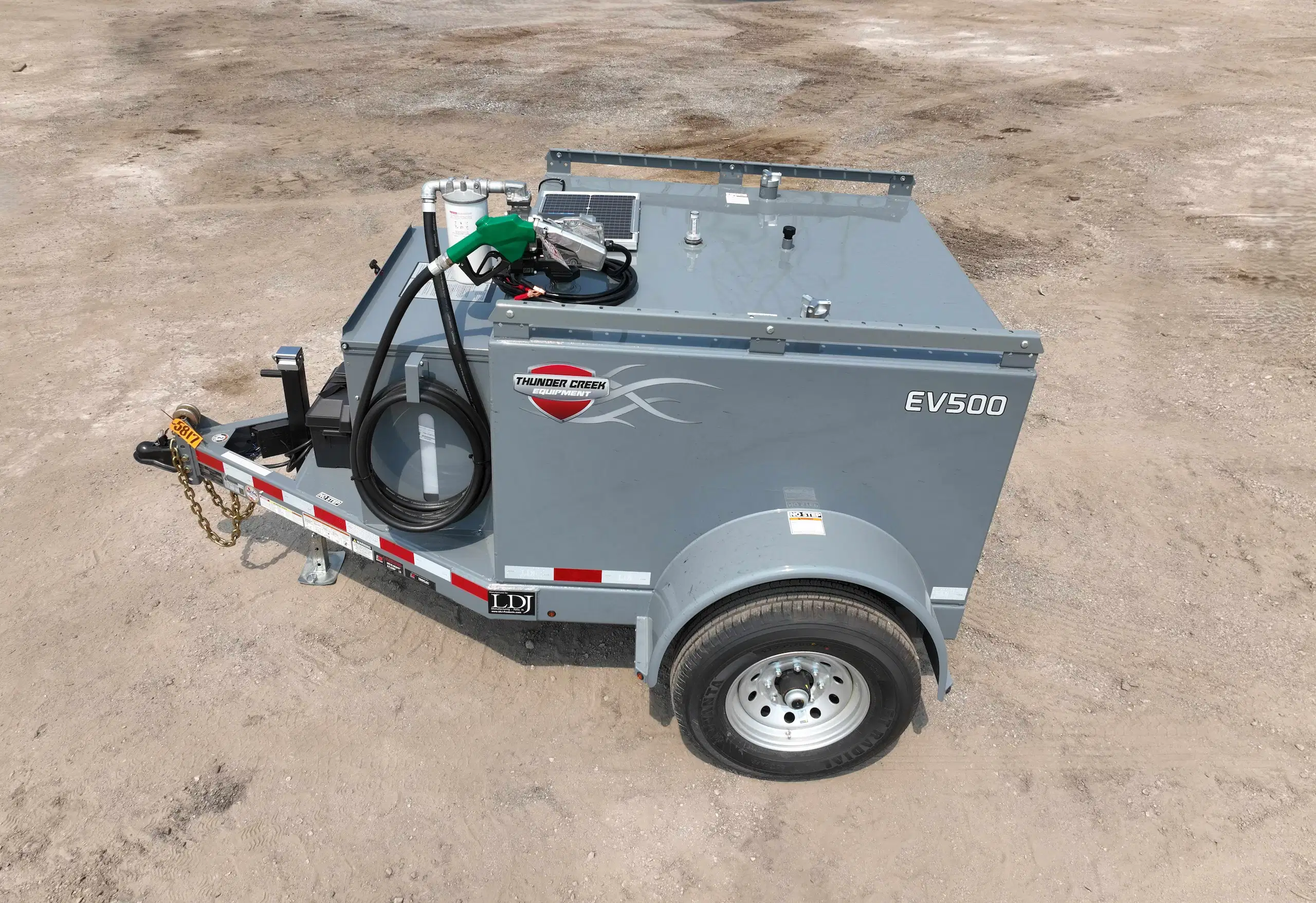 Thunder Creek EV500 fuel trailer with integrated pump, hose reel, and secure tank for mobile fueling operations.