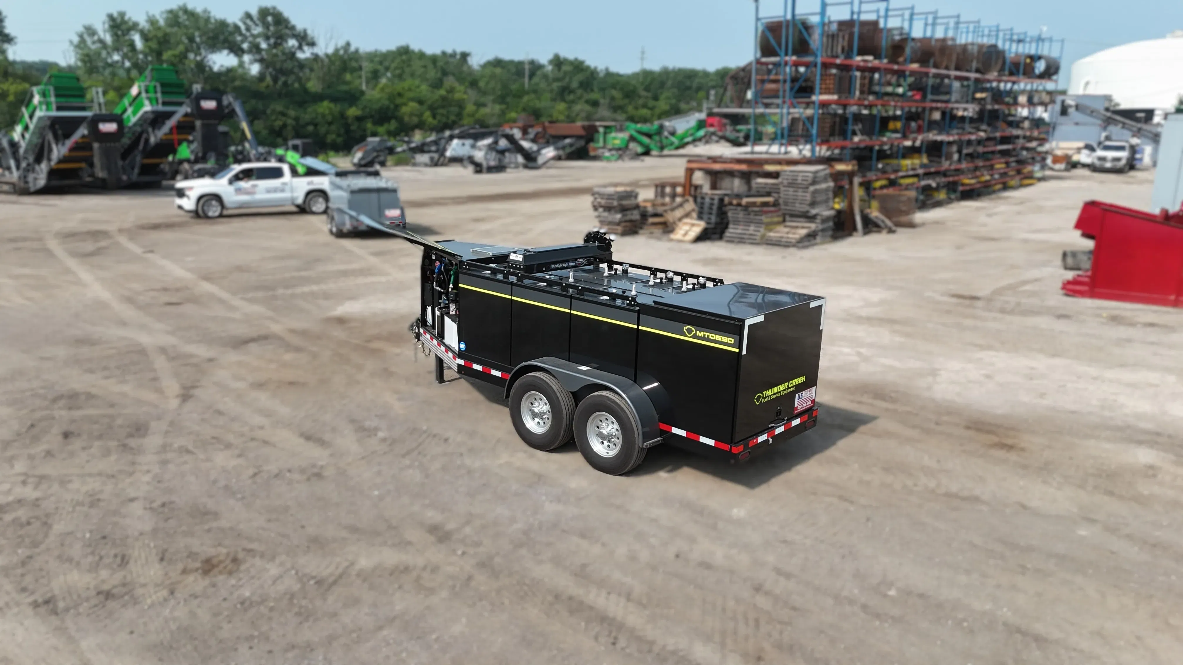 Thunder Creek MT fuel and service trailer positioned in an equipment yard, built for jobsite fueling support.