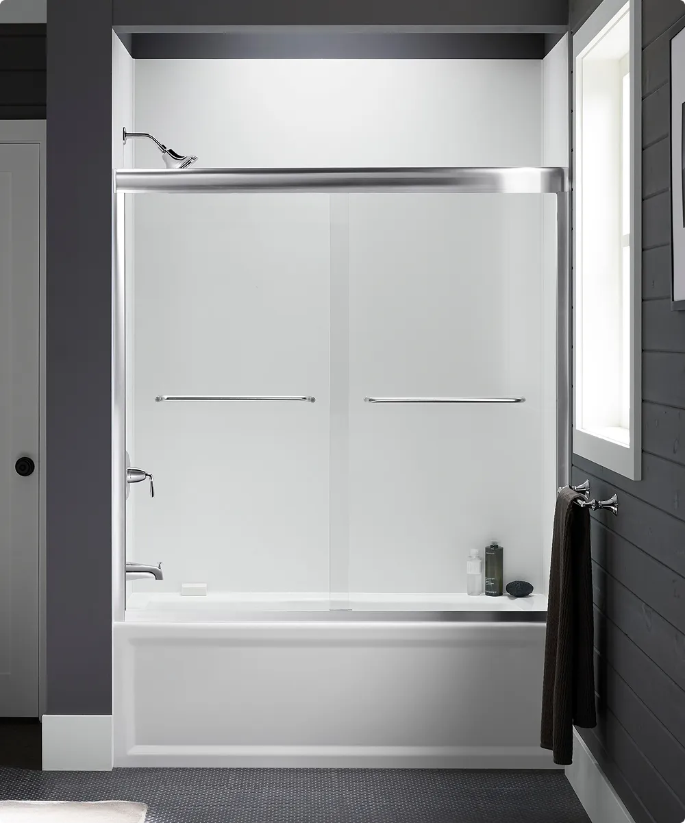 Modern Kohler shower remodel featuring sleek, glass panels and contemporary finishes.
