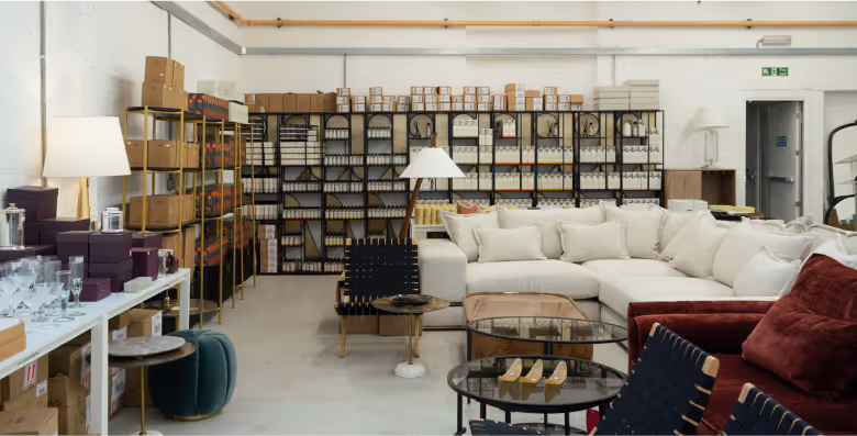 Warehouse sale with sofas, lamps, tables...