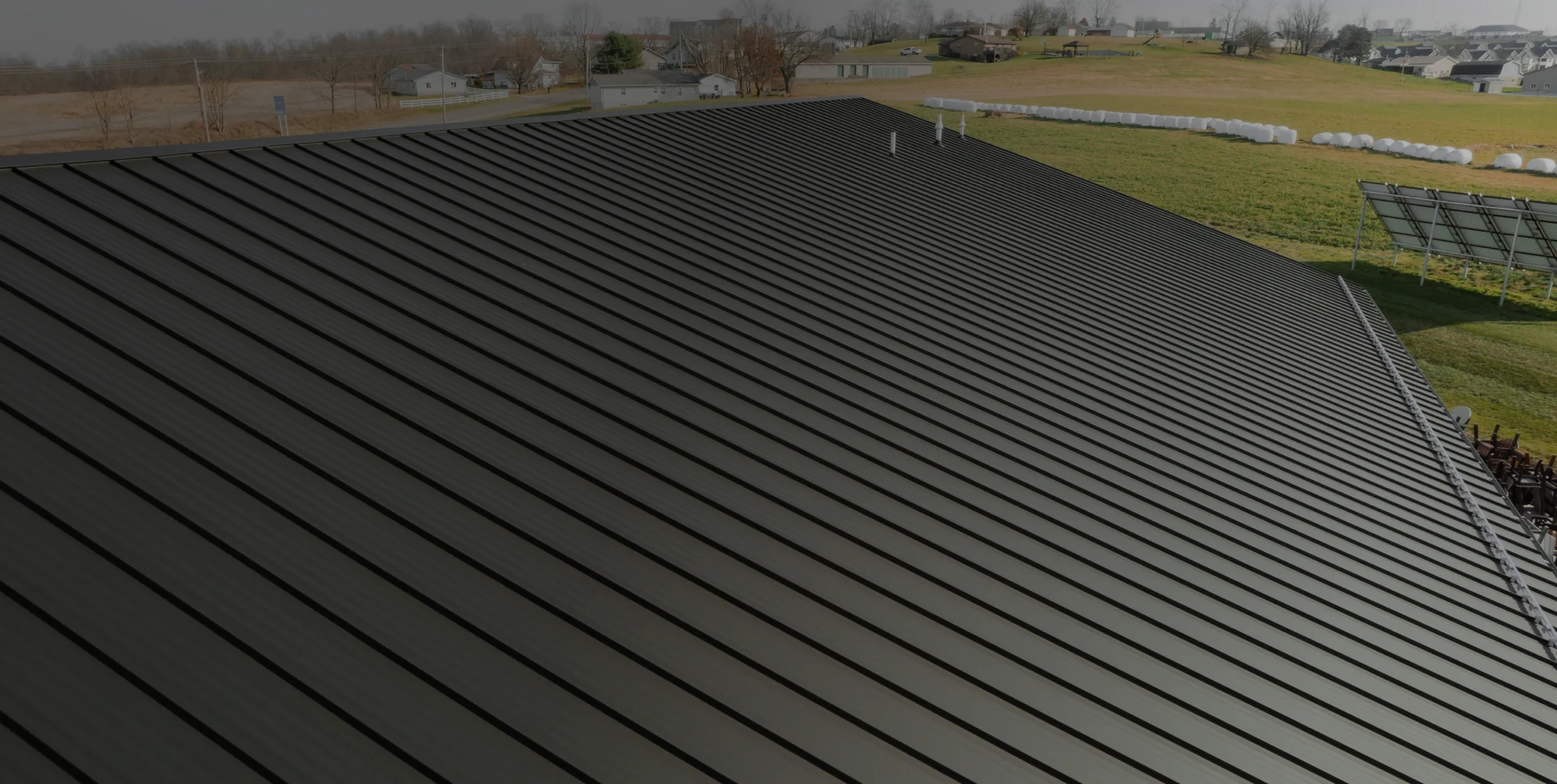 metal roof cascading down home roof