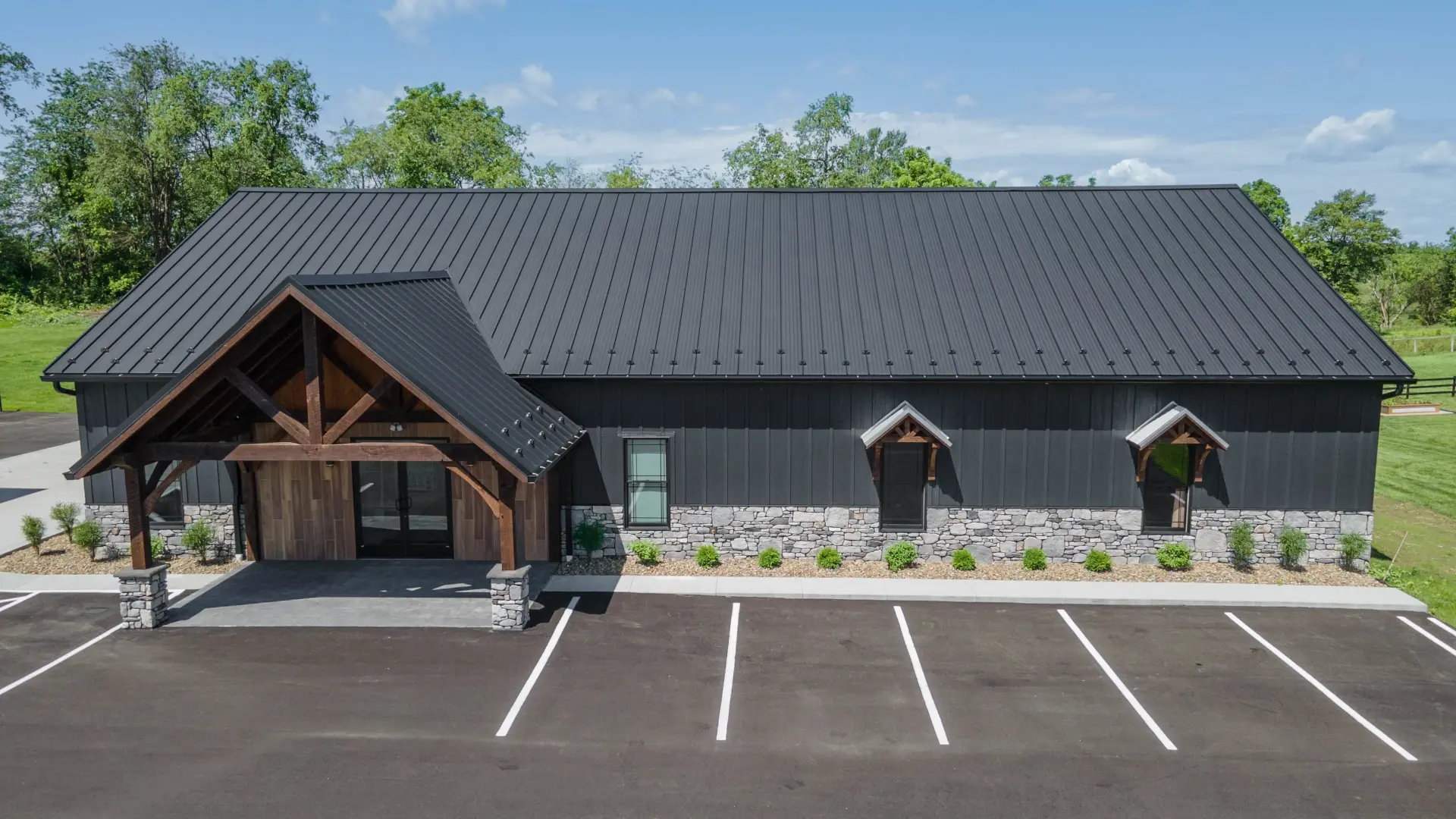 metal roof building with timber entrance