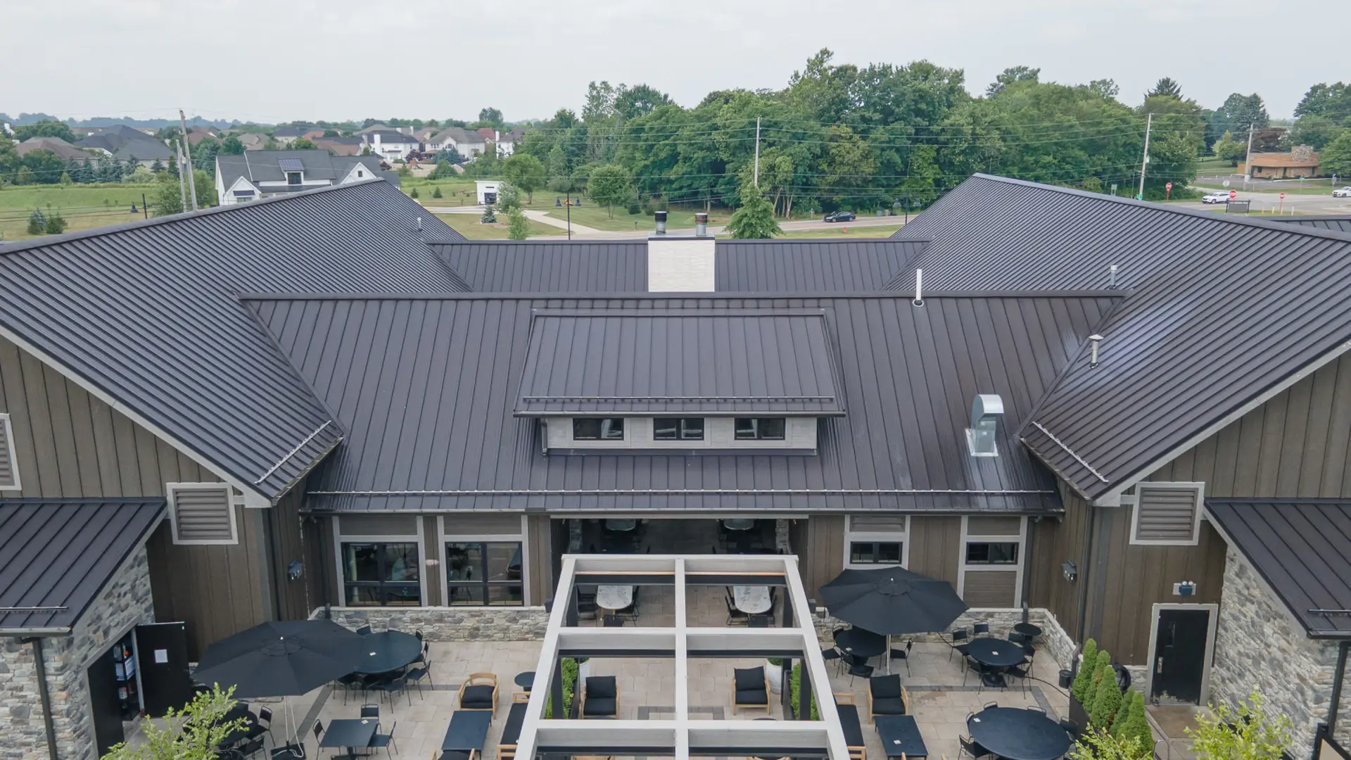 metal roof building with outdoor seating