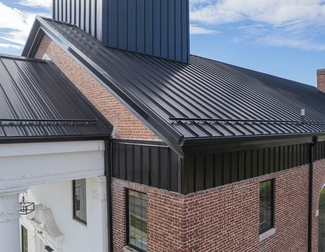 brick building metal roof snow guards