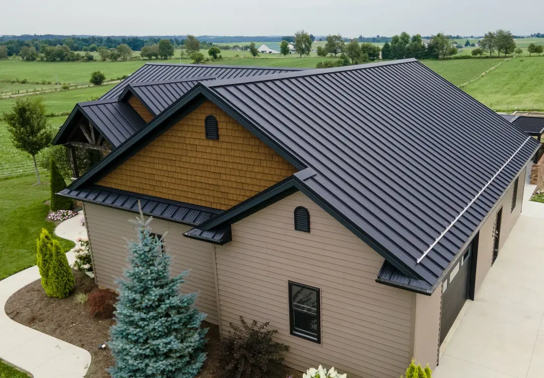 metal roofing home with shaker siding