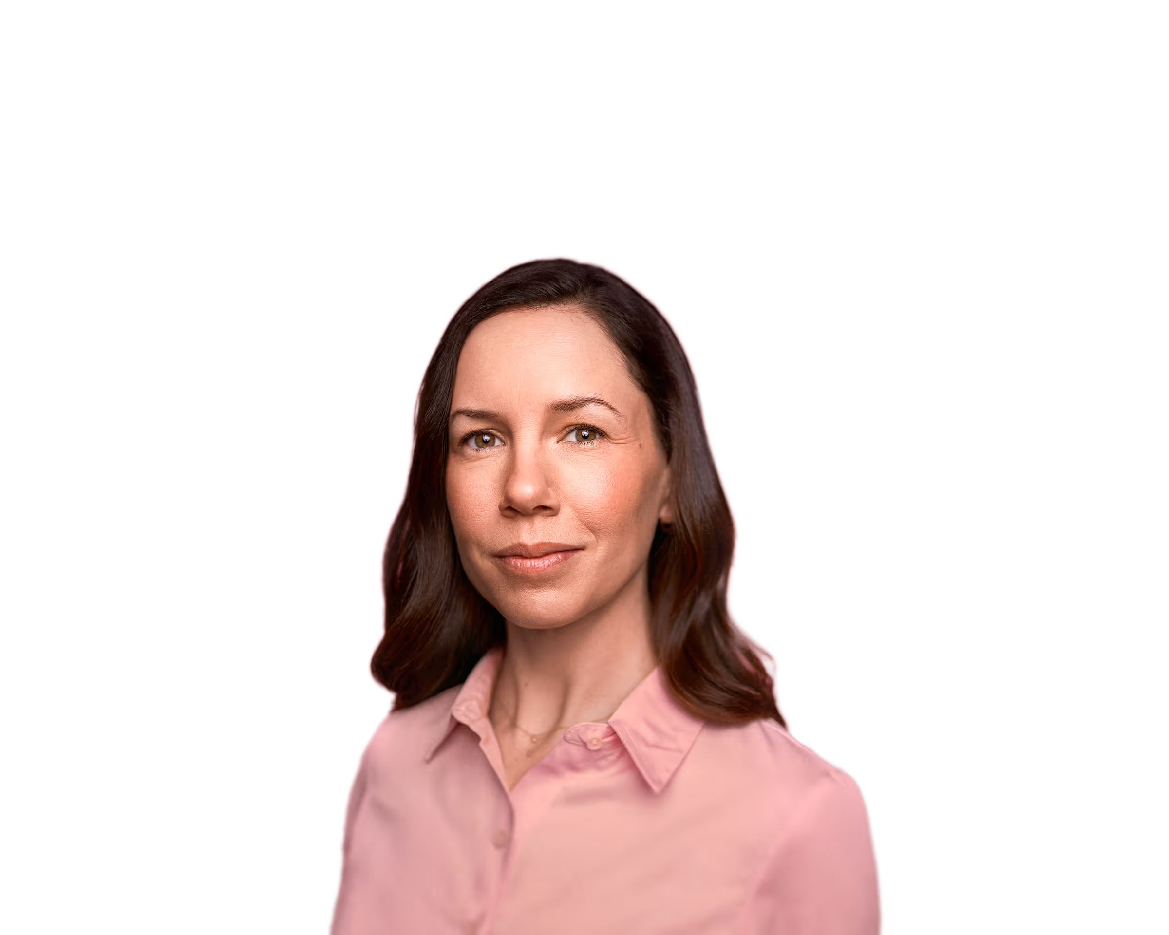 Woman with light skin and brown hair wearing a pink collared shirt against a white background.