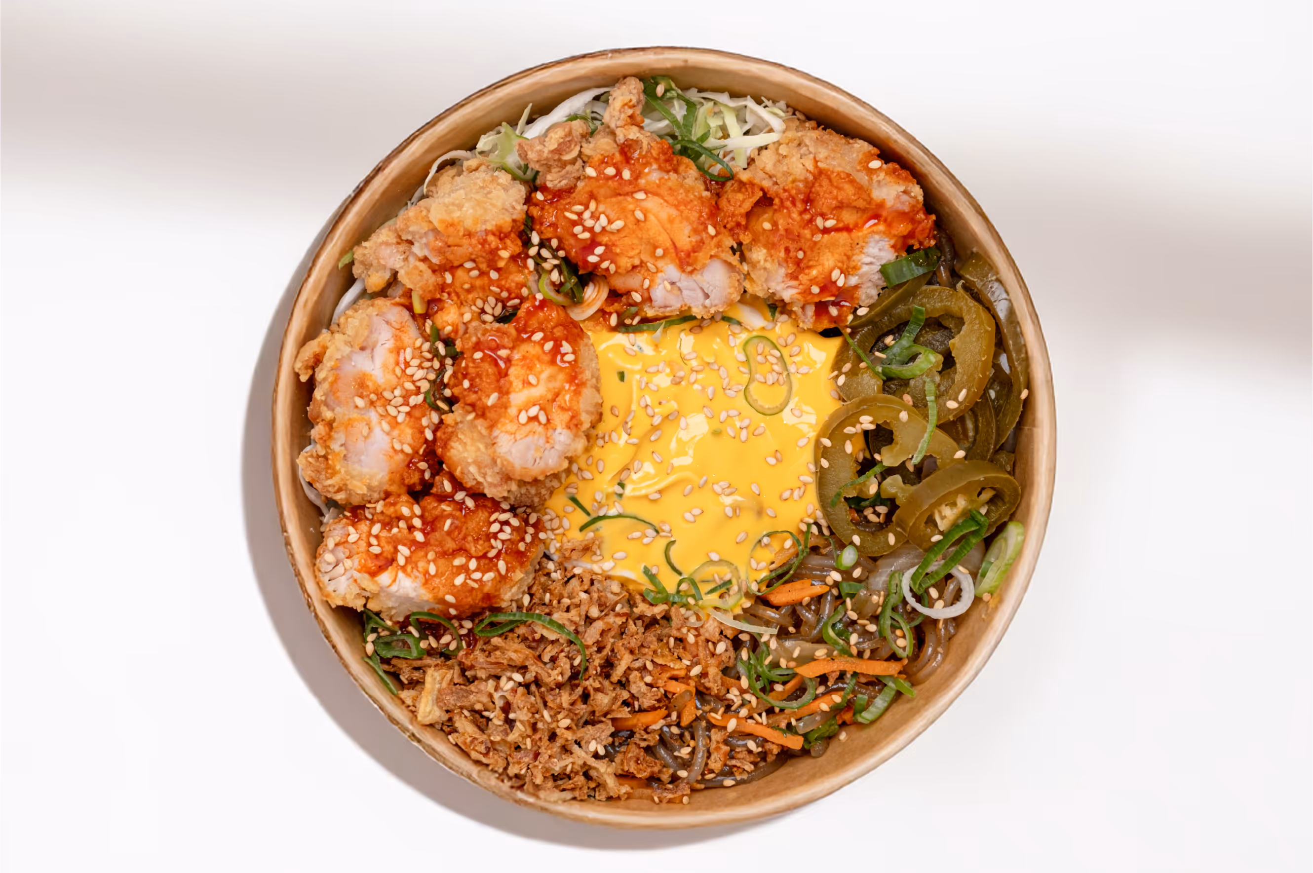 Signature Bowl dish with various korean dishes from the Menu of Won Chicken in Hamburg