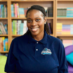 Jennifer Mowbray smiling in school staff photo