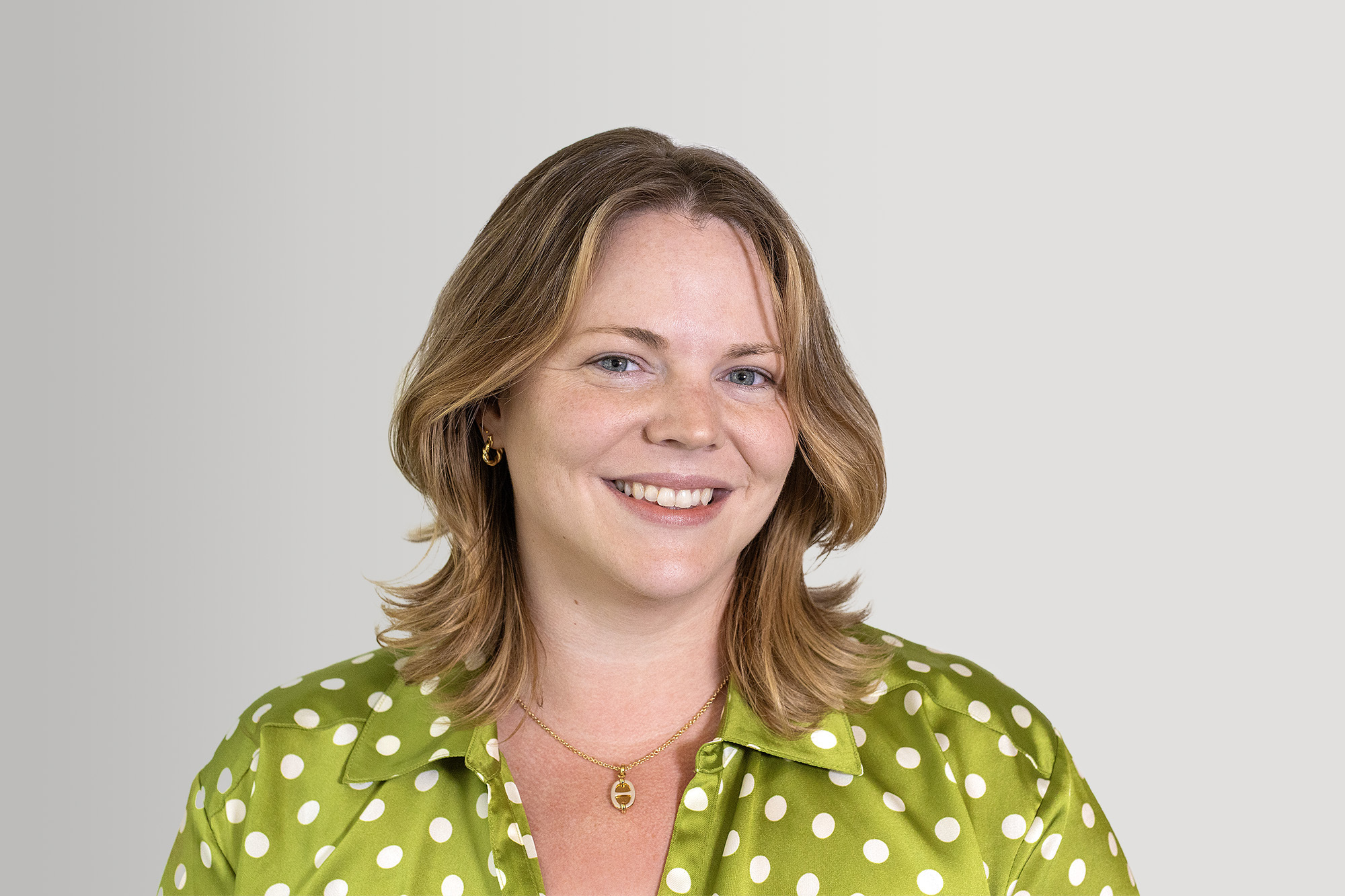 Head shot of Ellie Caldwell, woman smiling