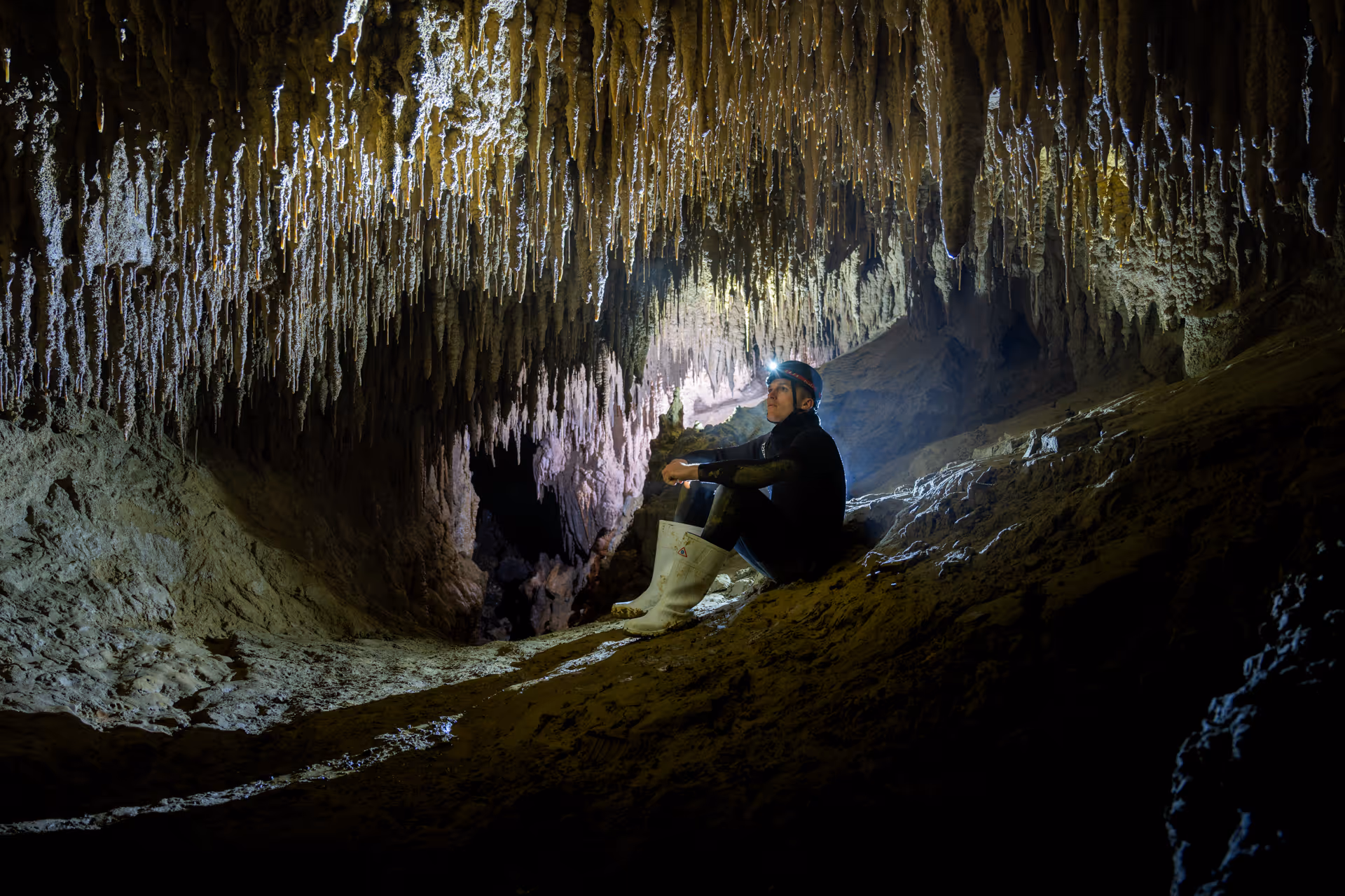 Stalagmites and stalactites grow from the ceiling and floor of the cave, creating a breathtaking display of natural beauty. 
