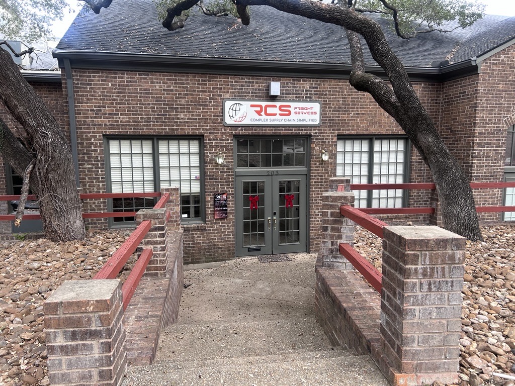 “Storefront of RCS Freight Services in San Antonio, Texas, featuring the office exterior and entrance of our nationwide freight brokerage.