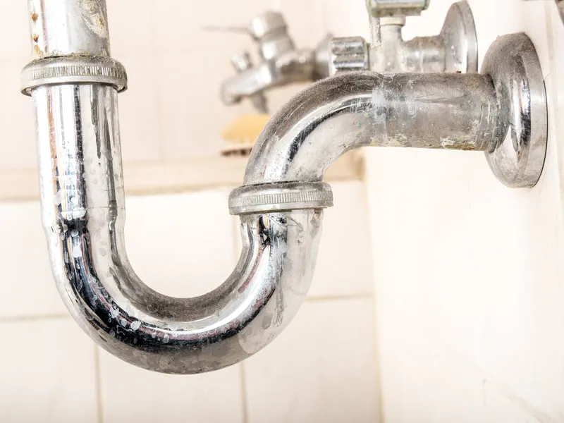A damage sink pipe with leaks
