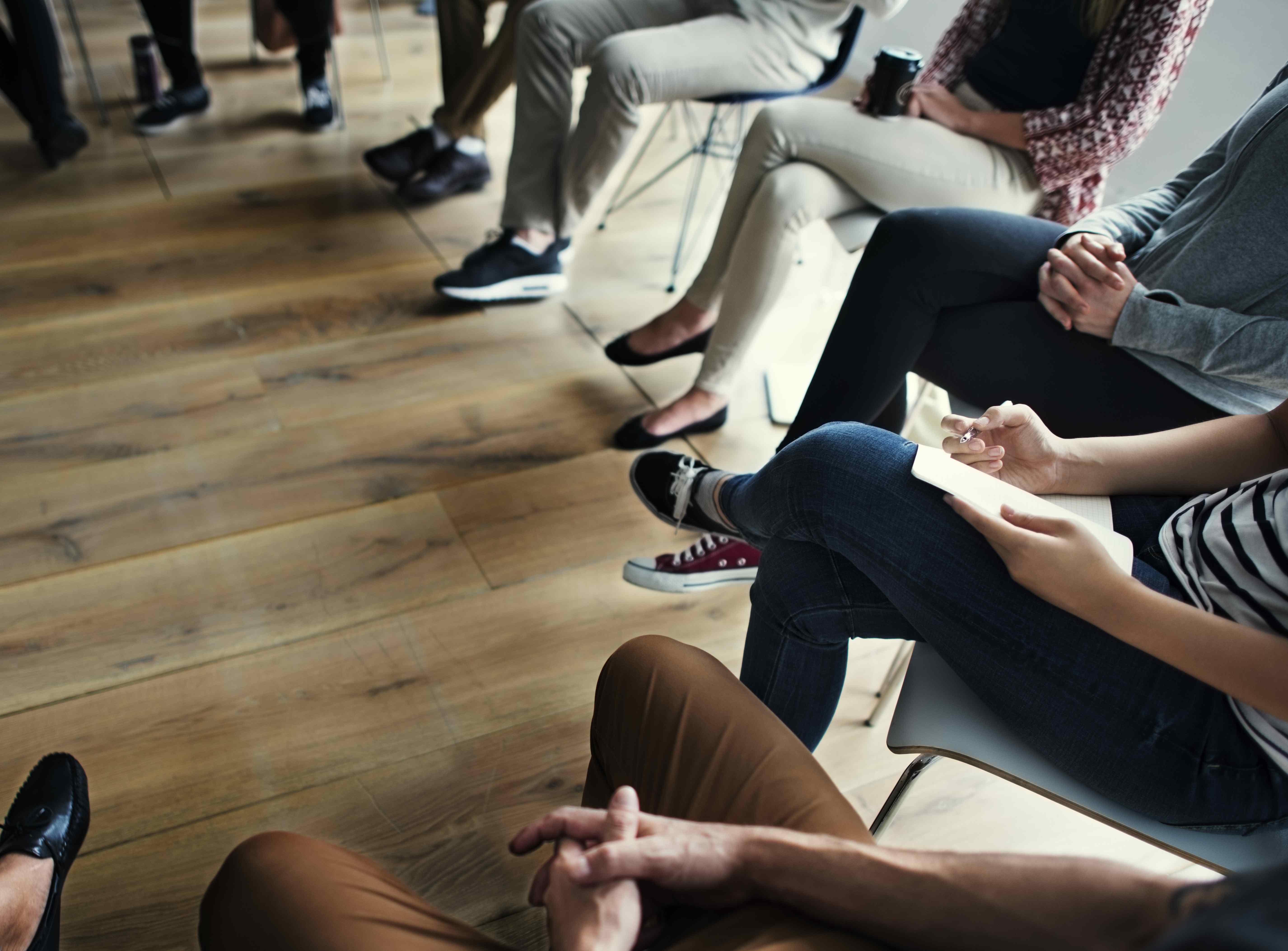 Image of people sitting in a circle