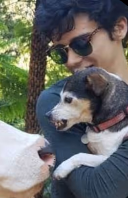 Black and white close-up headshot of Darin McFadyen, Partner at Turba Media, wearing glasses and a dark hoodie.