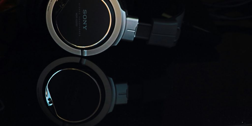 a pair of headphones sitting on top of a table
