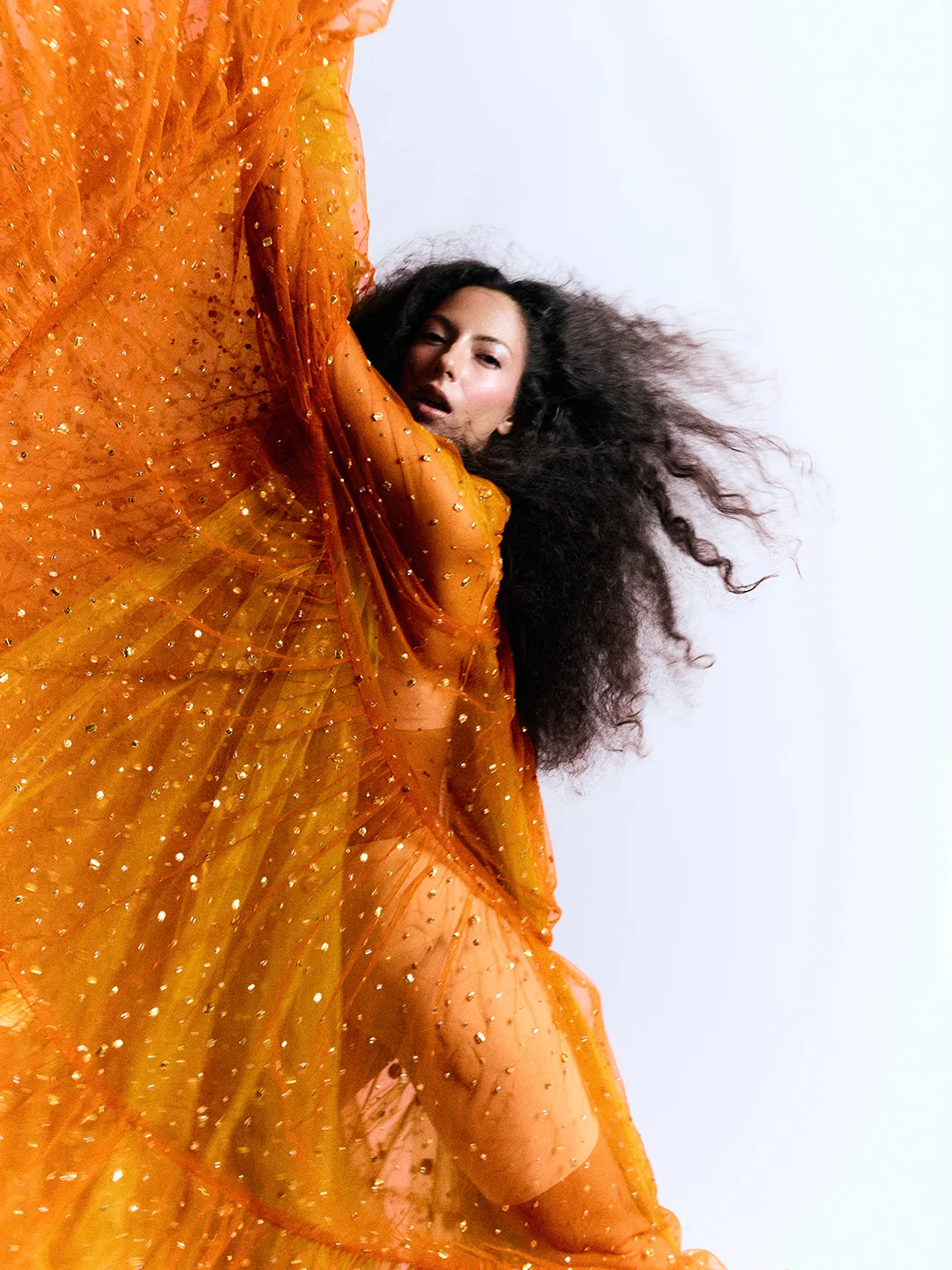 Primal 09 — Orange tulle in motion