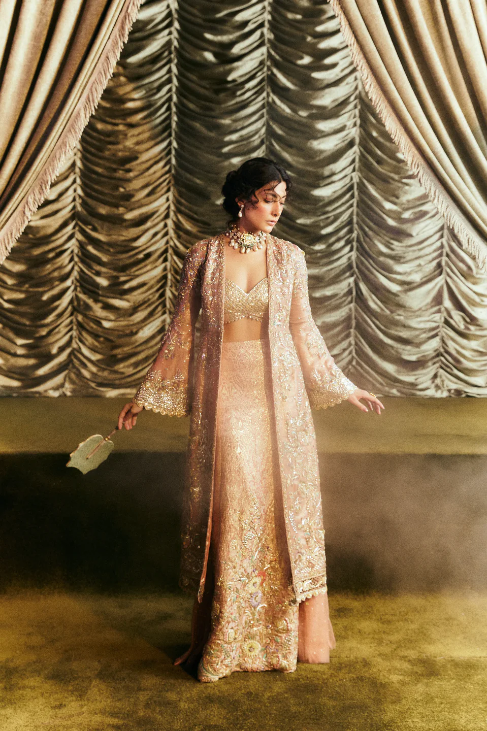 Soft Era: The Rococo, gold tissue against the gathered curtain.