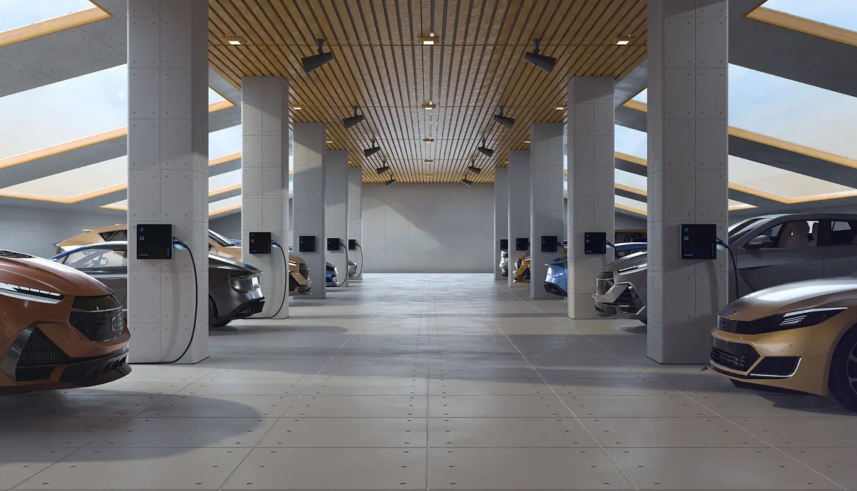 Parking d'entreprise avec une flotte de véhicules électriques en charge sur des bornes murales