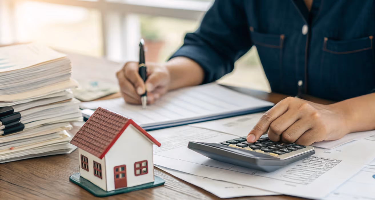 Mortgage statement being reviewed by a homeowner at a desk, with due dates, grace period, and escrow details being noted.