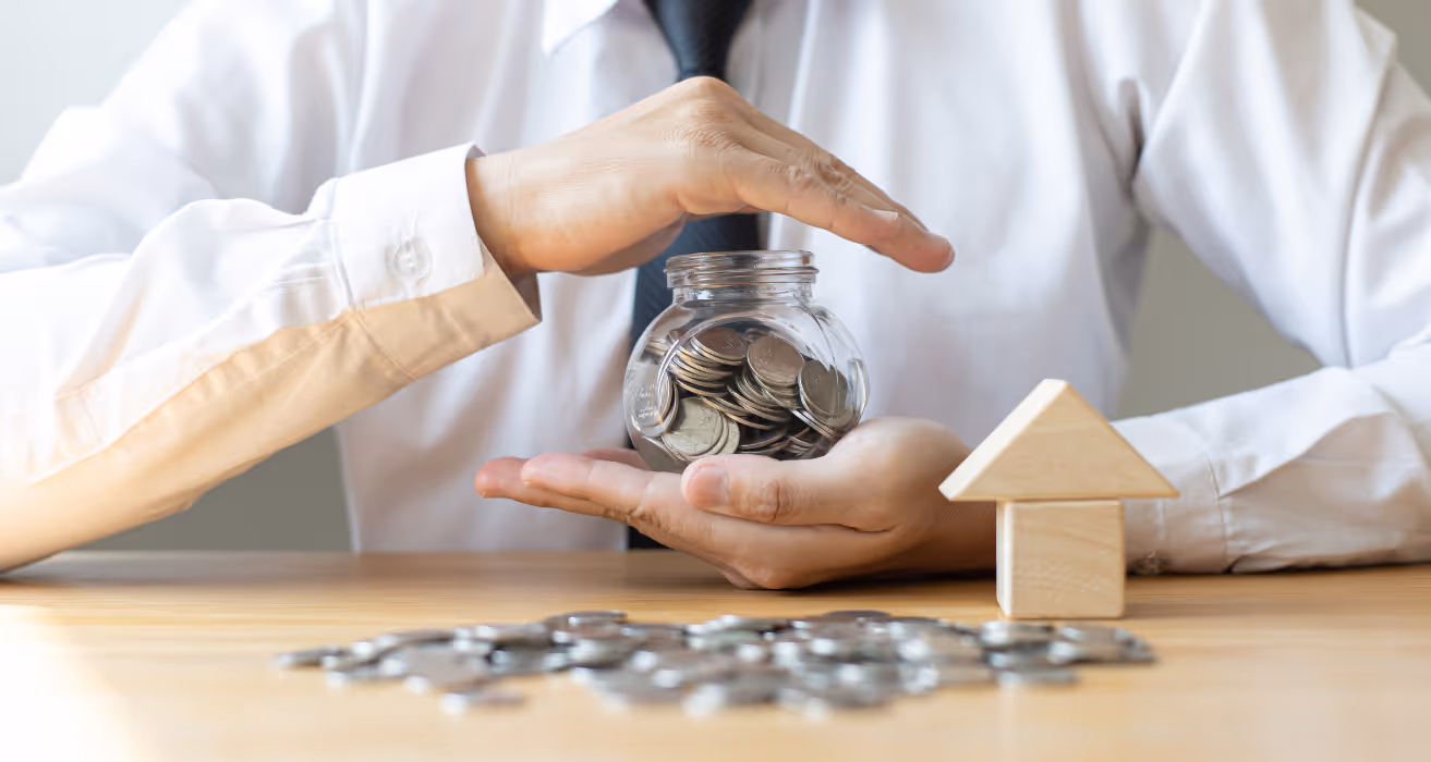 Cash buyer discussing delayed financing with advisor, reviewing documents and planning mortgage after home purchase.