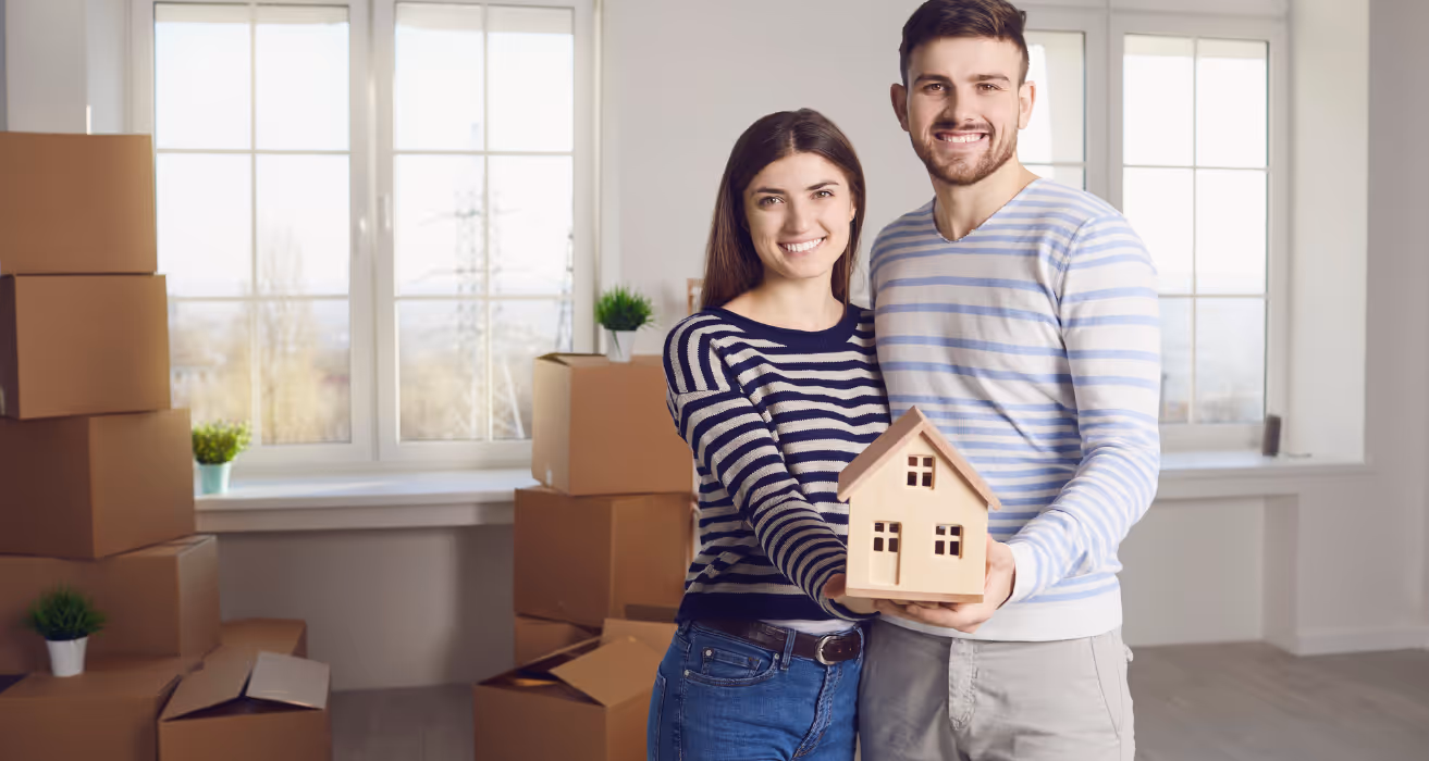 Homeowners reviewing mortgage papers to see if they qualify for RefiNow or Refi Possible refinance programs in 2025.