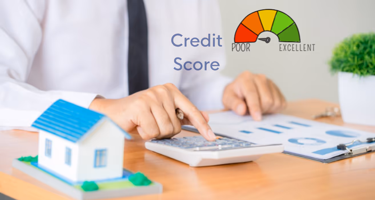 Person reviewing credit score data with charts, calculator, and house model on desk, evaluating financial readiness for a mortgage.