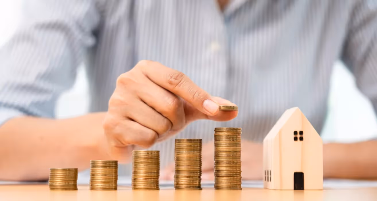 Homeowner analyzing mortgage refinance options with a financial advisor to decide if refinancing is the right financial move