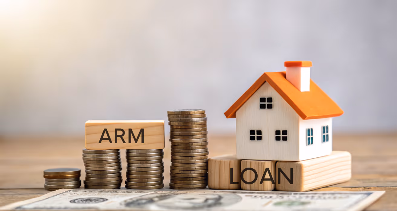 Homeowner checking mortgage rate trends to decide the best time to refinance an adjustable-rate mortgage (ARM) loan
