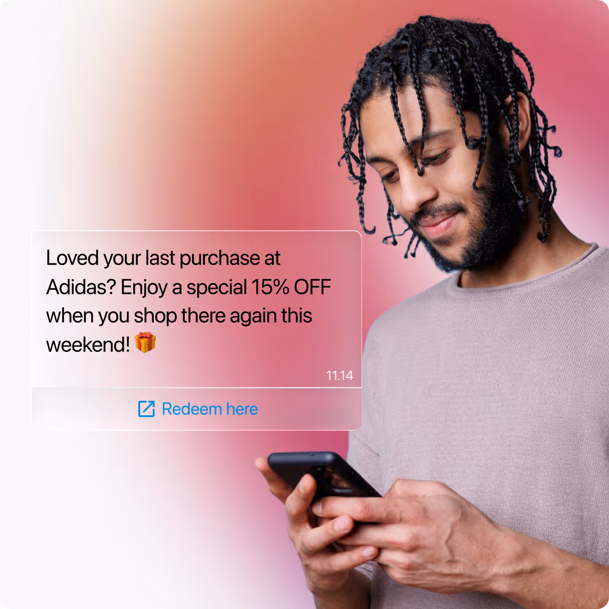 A smiling man with braided hair looks at his phone, next to a message offering 15% off a future Adidas purchase with a redeem link.